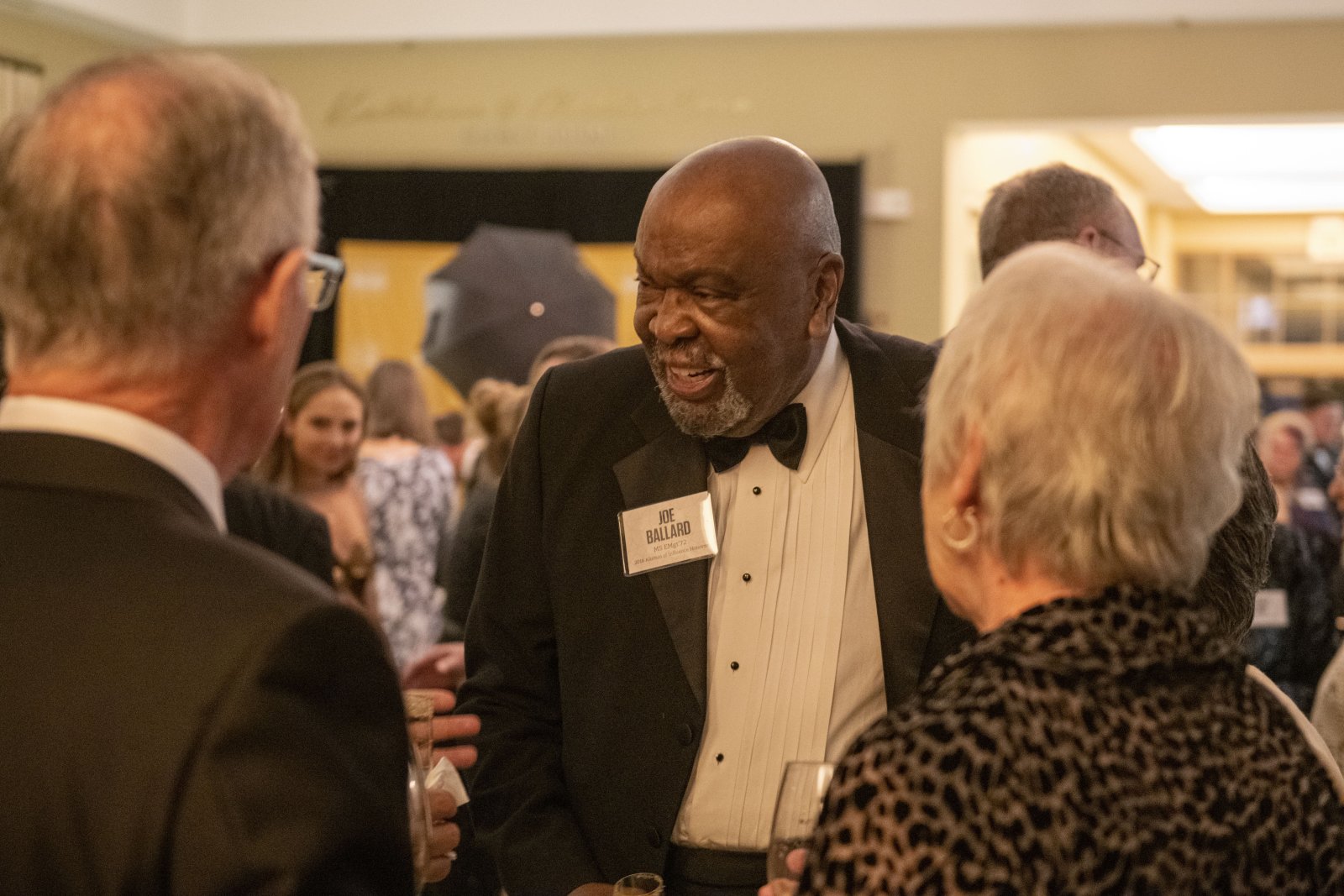 people at alumni of influence event